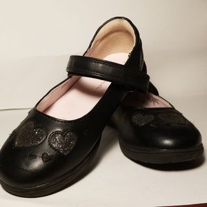 Black leather flats